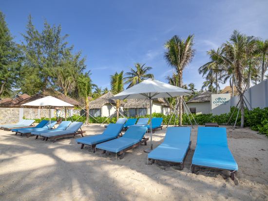 Фото Coco Cottage Beachfront Resort