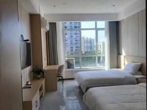 Zhangye Kapok Apartment (30 Meters Front Of Sales Department Of Jingfu Ningyuan Park,Zhangsu Highway,734000 Zhangye,), hotel