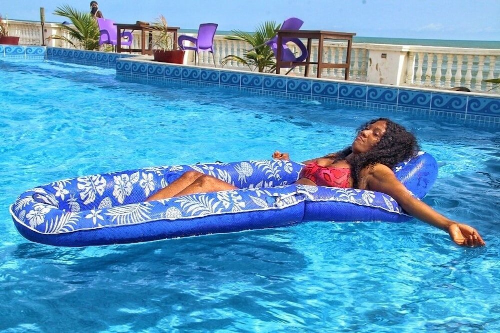 Фото Coconut Pointe Villa & Beach Resort