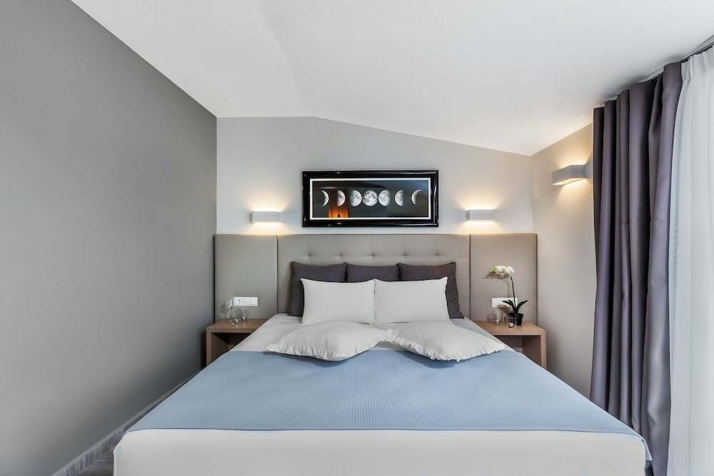 Фото Nymphes Deluxe Accommodation