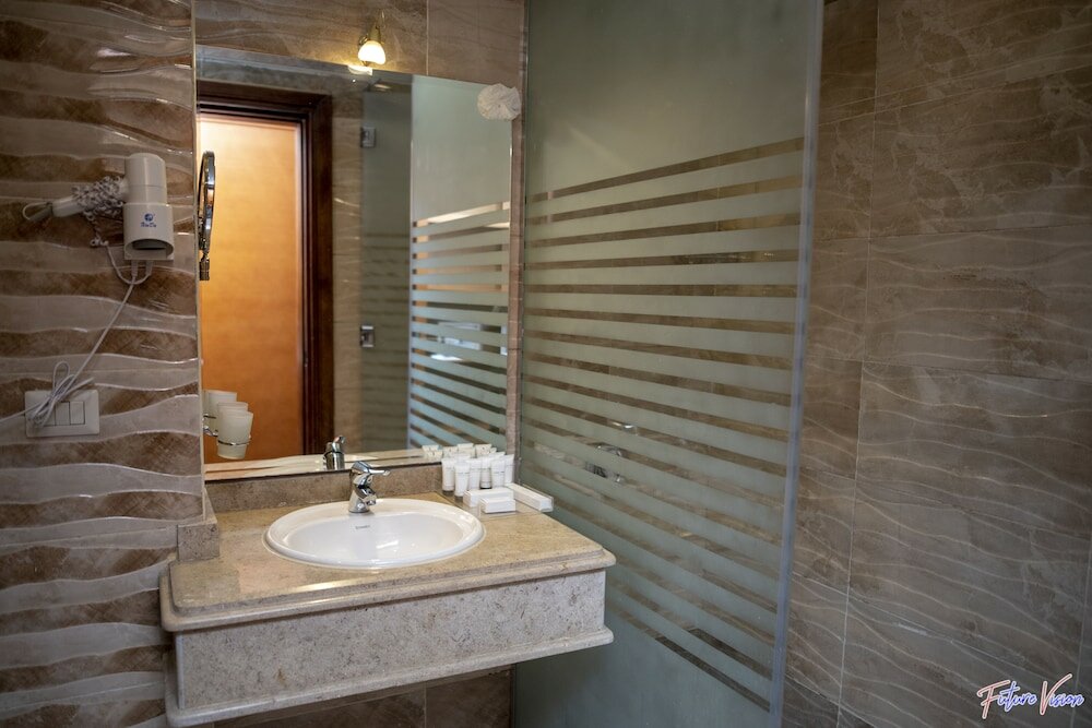 Фото Rehana Plaza Hotel