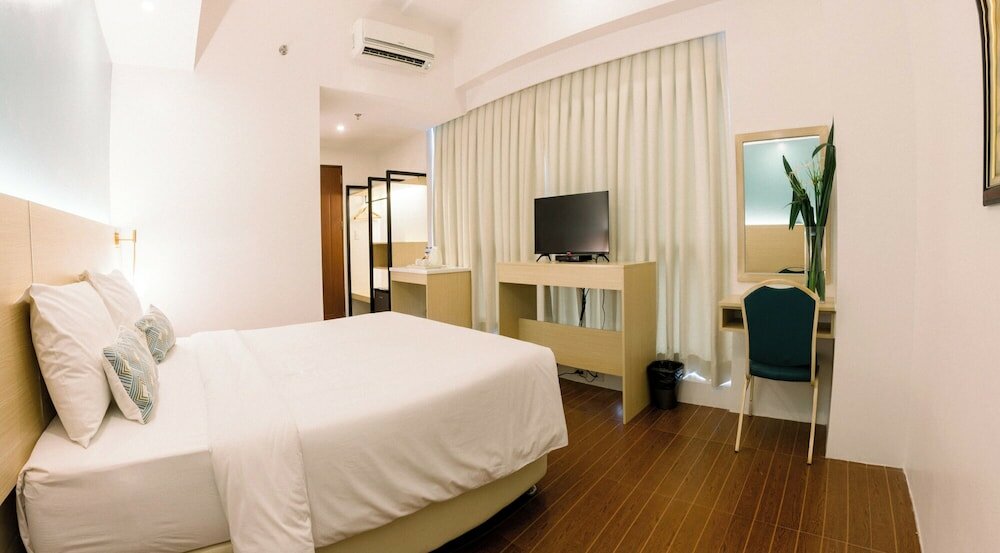 Фото Allure Hotel & Suites