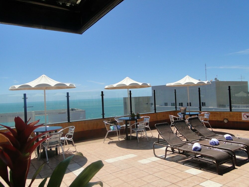 Фото Plaza Praia Suites