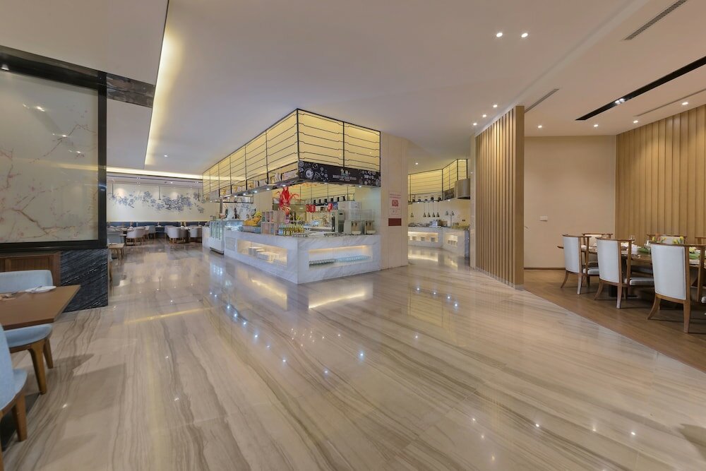 Фото Grand New Century Hotel Jingyue