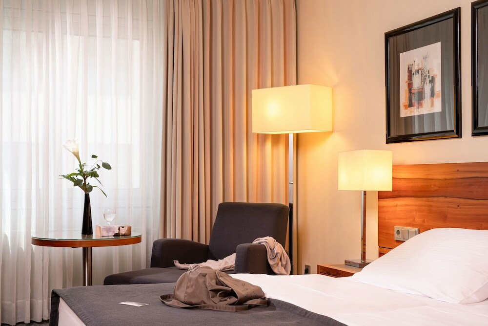 Фото Отель Maritim München