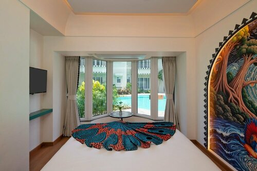 Гостиница Lotus Beach Resort в Бенаулиме