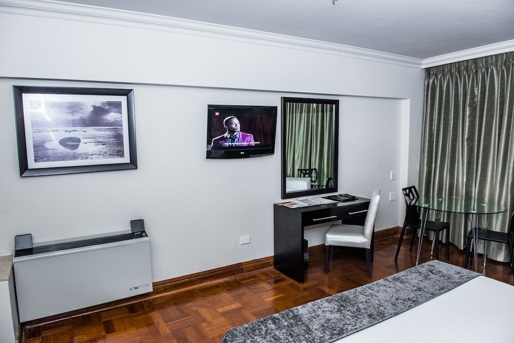 Фото Belaire Suites Hotel