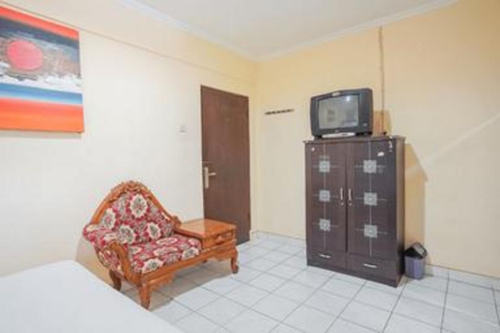 Фото Taman Mekar Beach Inn 2