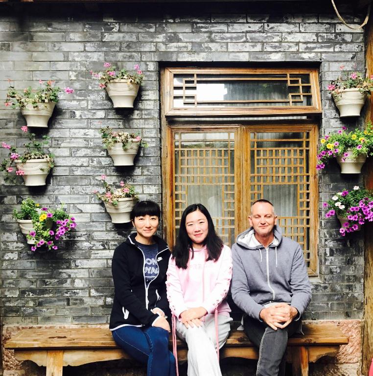 Фото Li Jiang Hemuju Inn