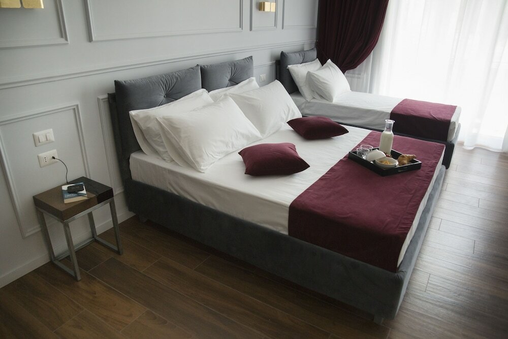 Фото Unicum Roma Suites