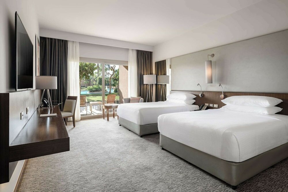 Фото Dusit Thani Lake View Cairo