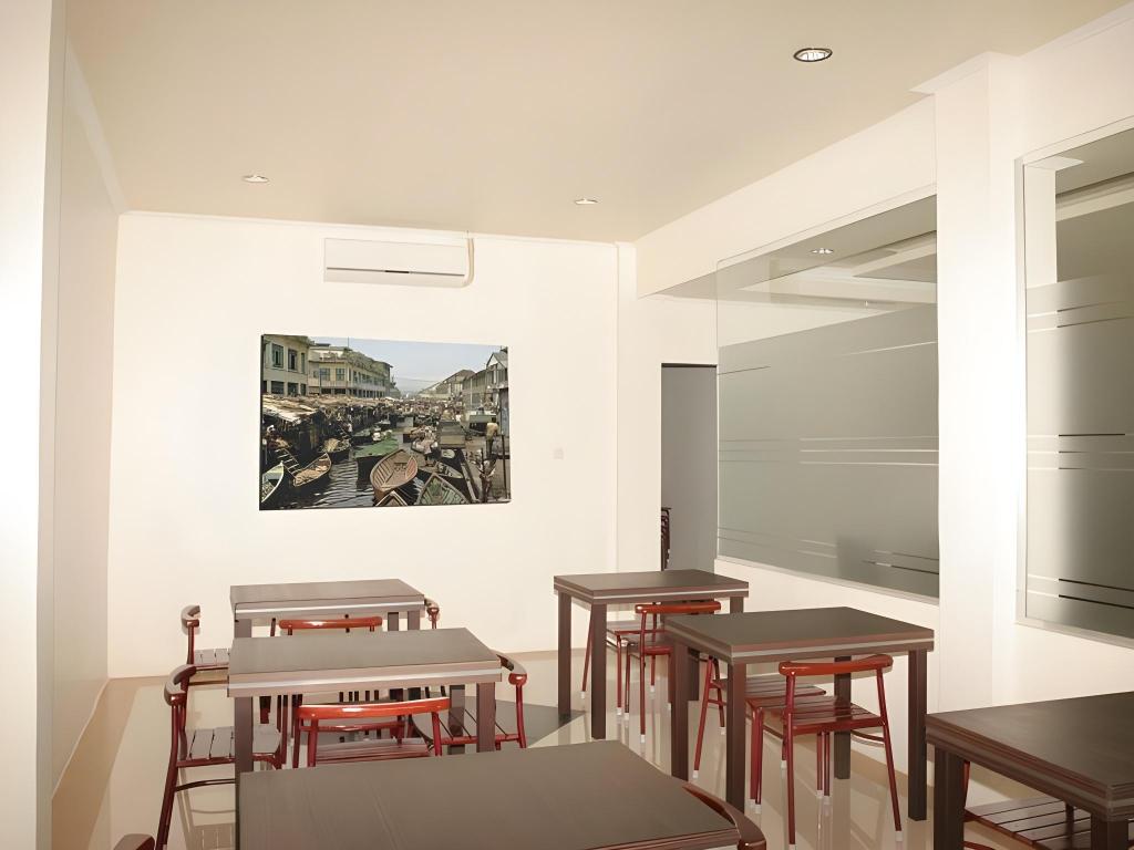 Фото Hotel Aroma Inn Pontianak