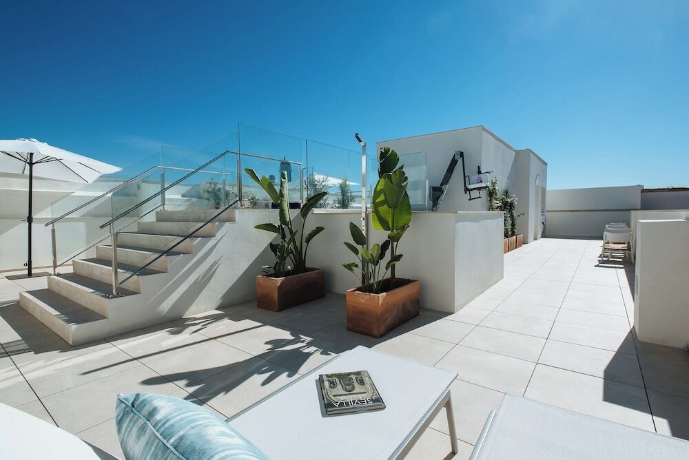 Фото Sercotel Sevilla Guadalquivir Suites