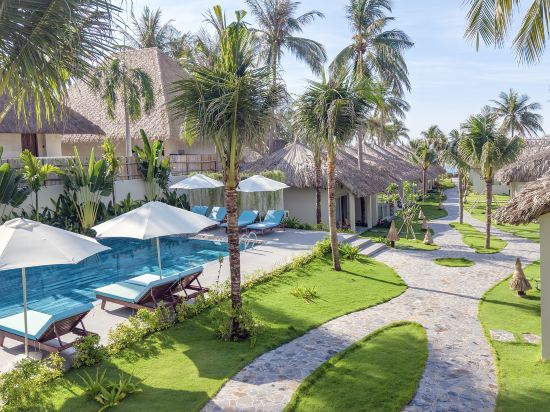 Фото Coco Cottage Beachfront Resort