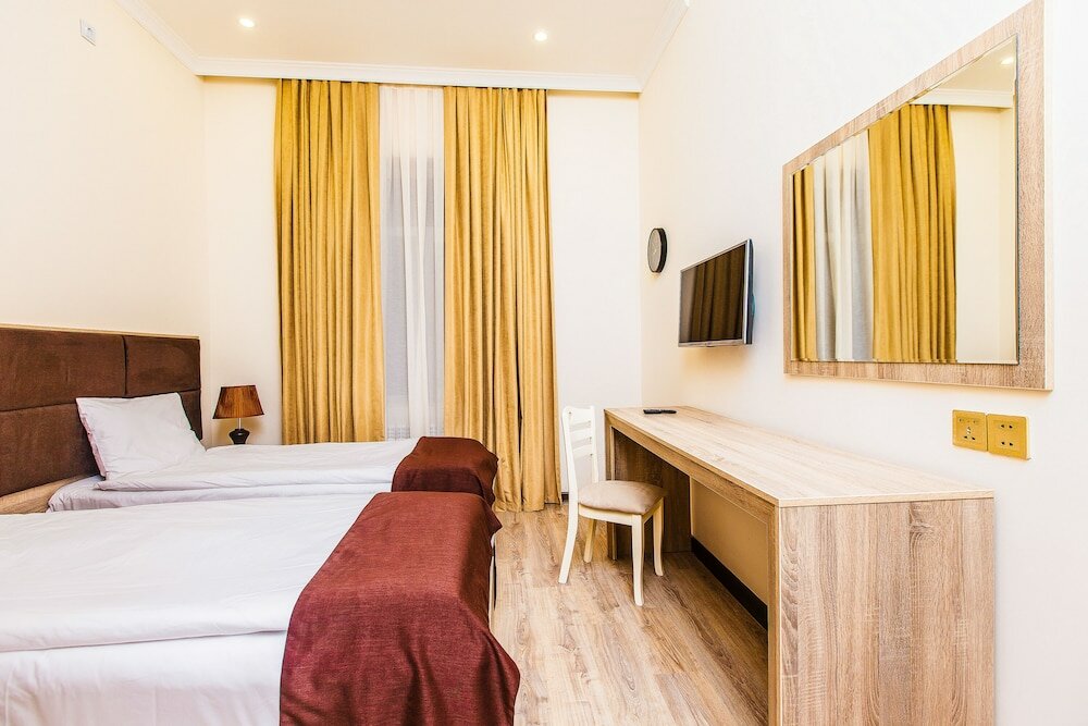 Фото Deluxe City Hotel