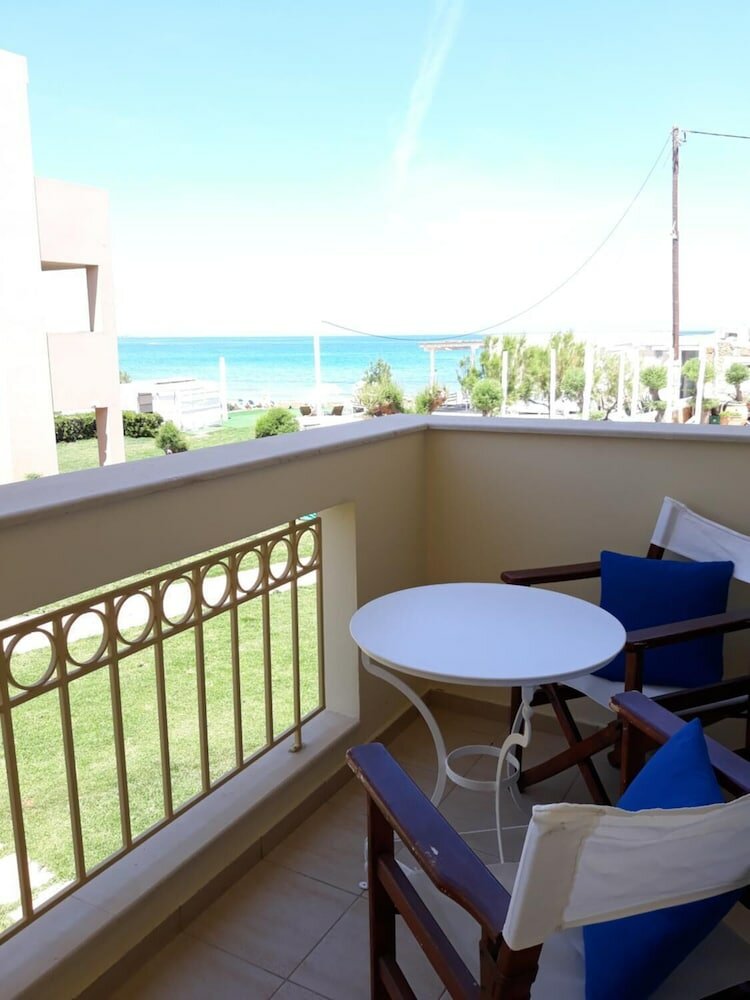 Фото Parthenis Beach Suites by the Sea