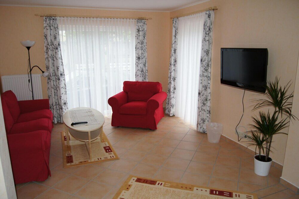 Фото Ferienwohnungen Buchholz