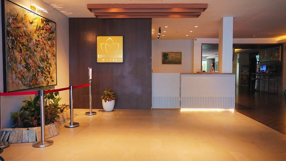 Фото Opi Indah Hotel
