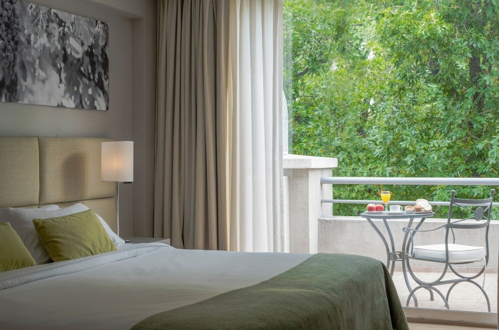 Фото Portal Plaza Suites