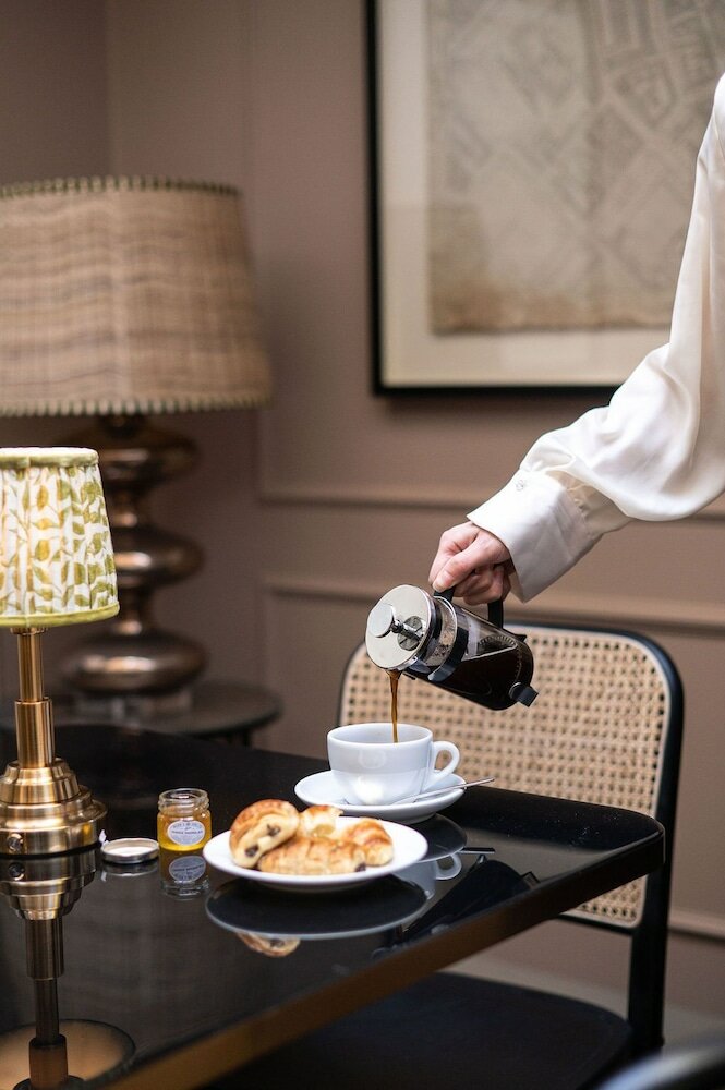 Фото Tophams Hotel