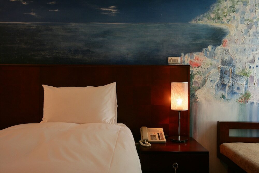 Фото In One City Inn