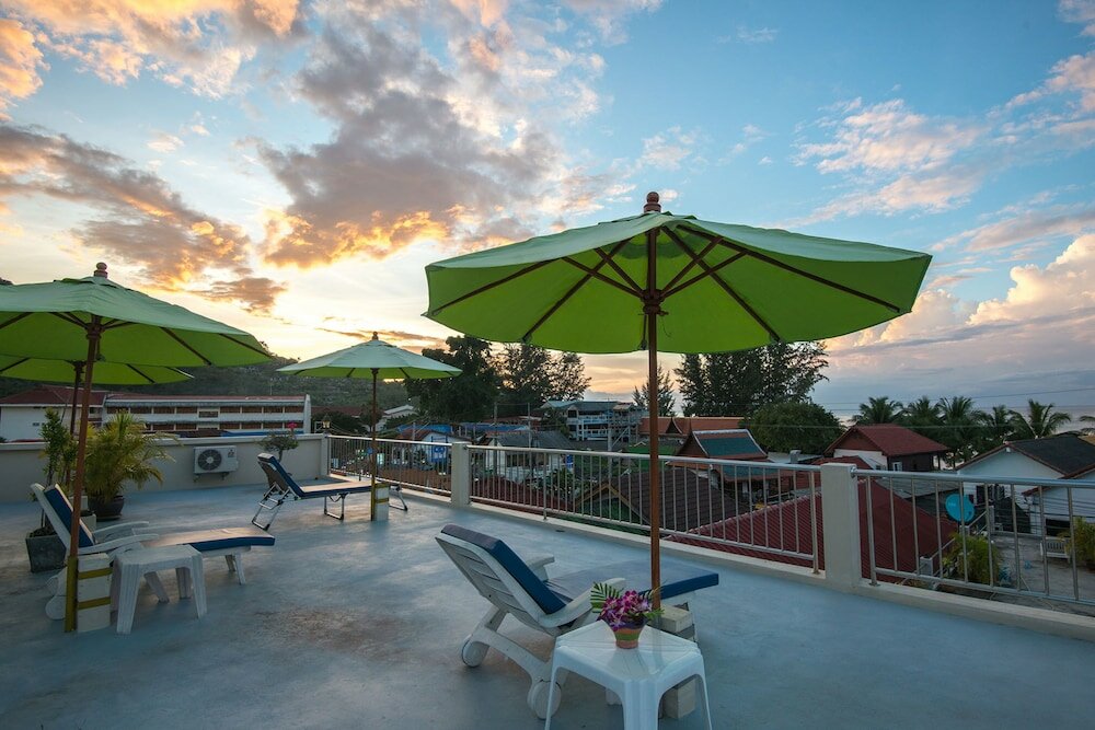 Фото At Kamala Hotel