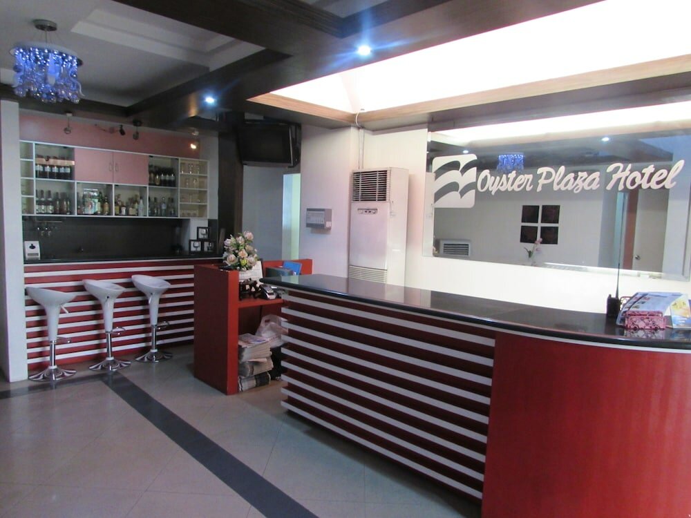 Фото Oyster Plaza Hotel