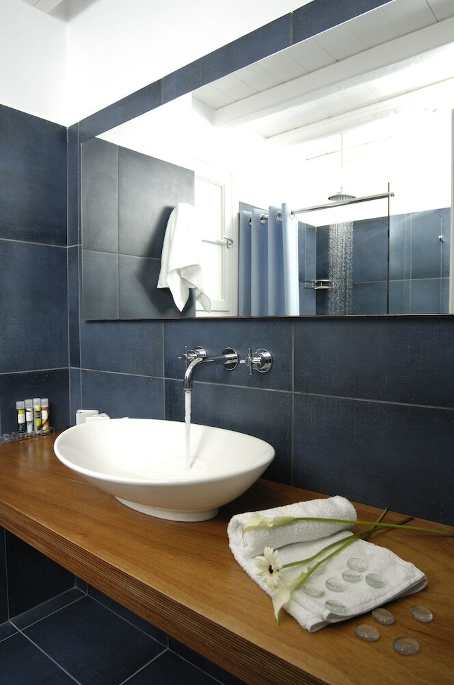 Фото Kapetan Tasos Suites