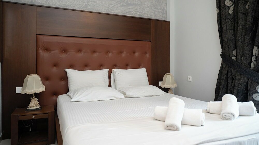 Фото Toti Boutique Rooms