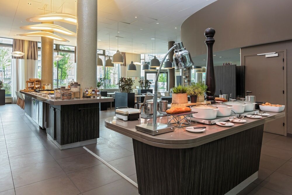 Фото Novotel Paris Saint Denis Stade Basilique