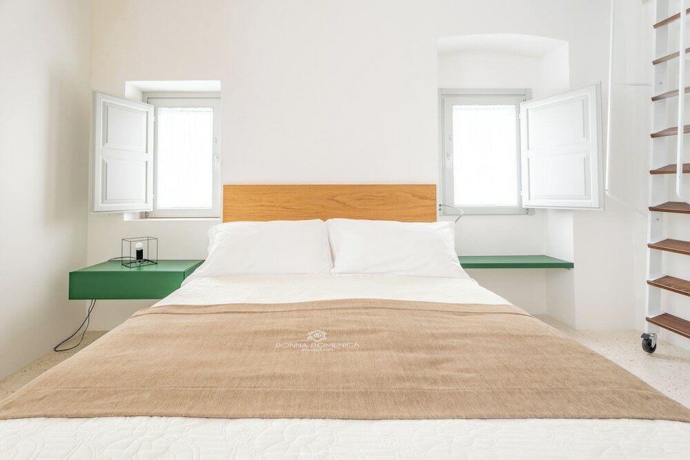 Фото Donna Domenica Boutique Suites