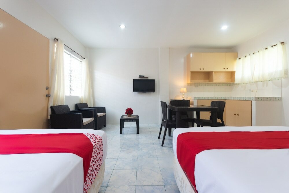 Фото Oyo 556 3j's And K Apartment