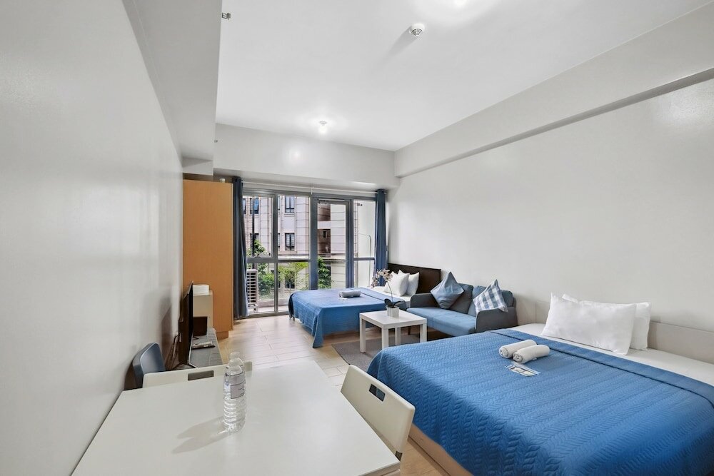 Фото Tess and Tessha Condotel near T3 Airport