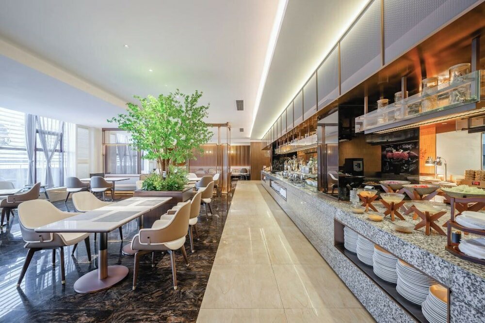 Фото Shanghai Maixinge International Hotel