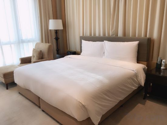 Фото Somerset Grand Central Dalian