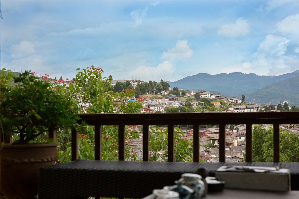 Фото Merry Inn Lijiang