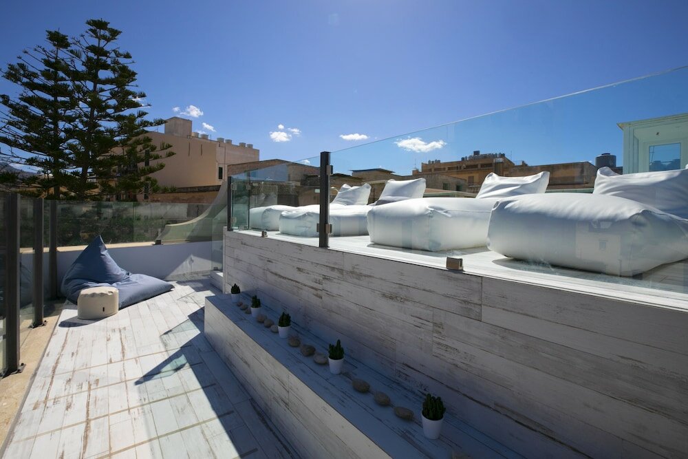 Фото Azzoli Trapani - Apartments & Skypool - Adults Only