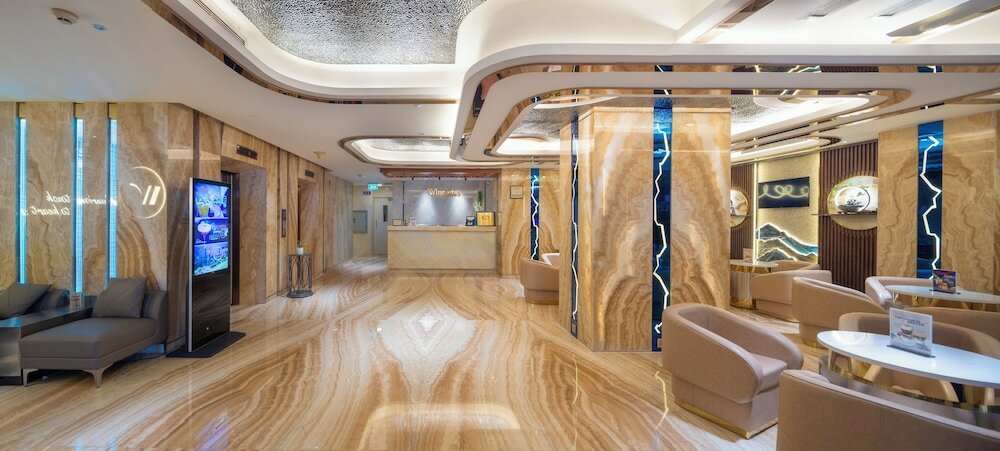 Фото Winsuites Saigon Hotel