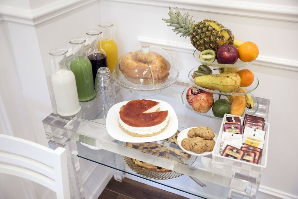 Фото Unicum Roma Suites