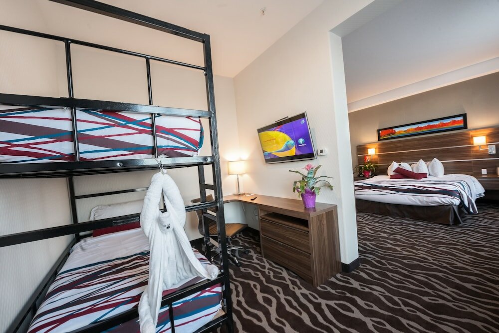 Фото Encore Suites by Service Plus Inns