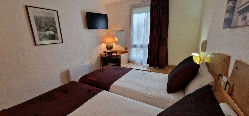 Фото Kyriad Direct Arpajon