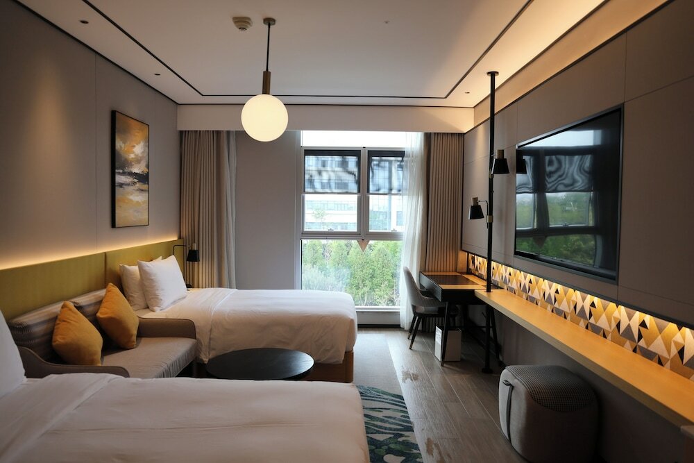 Фото Hilton Garden Inn Kunming Dianchi