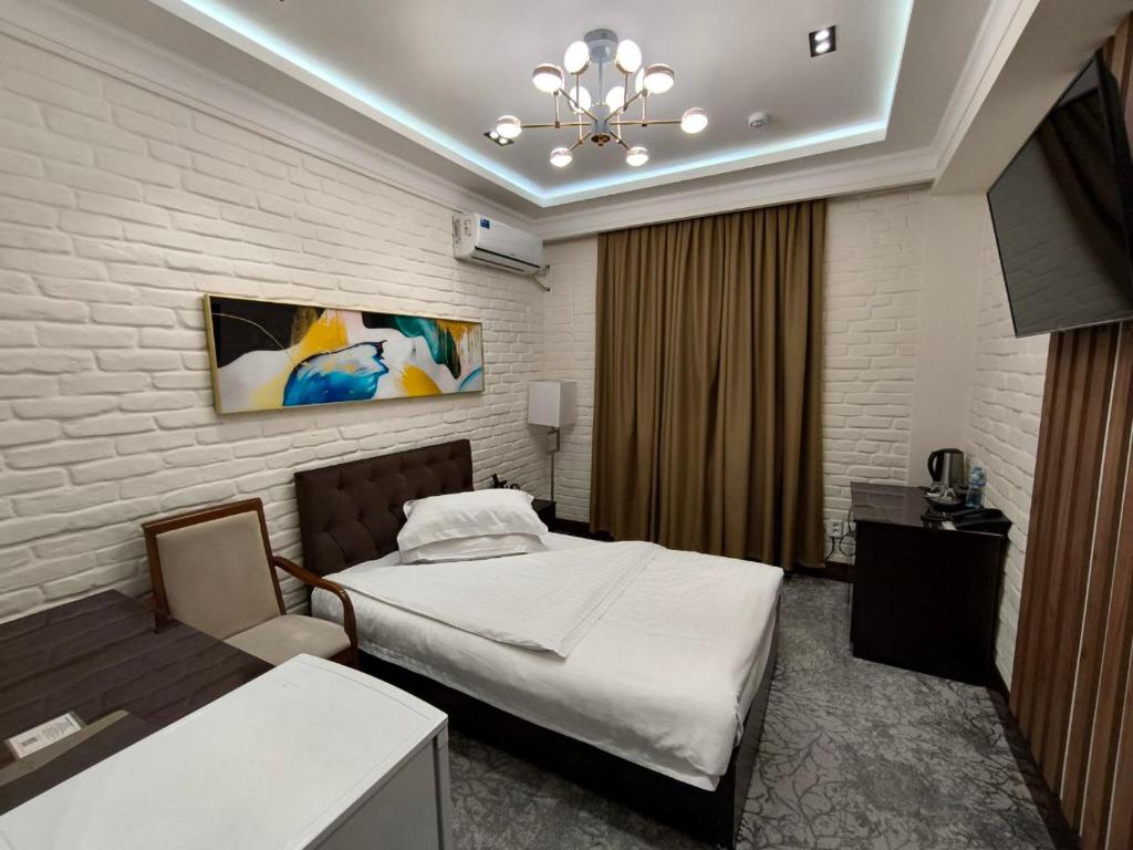 Фото Zarafshan Grand Hotel