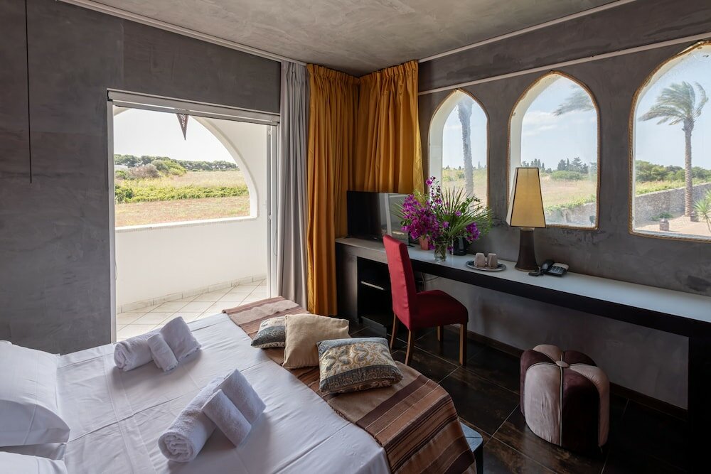 Фото Resort Baia dei Turchi