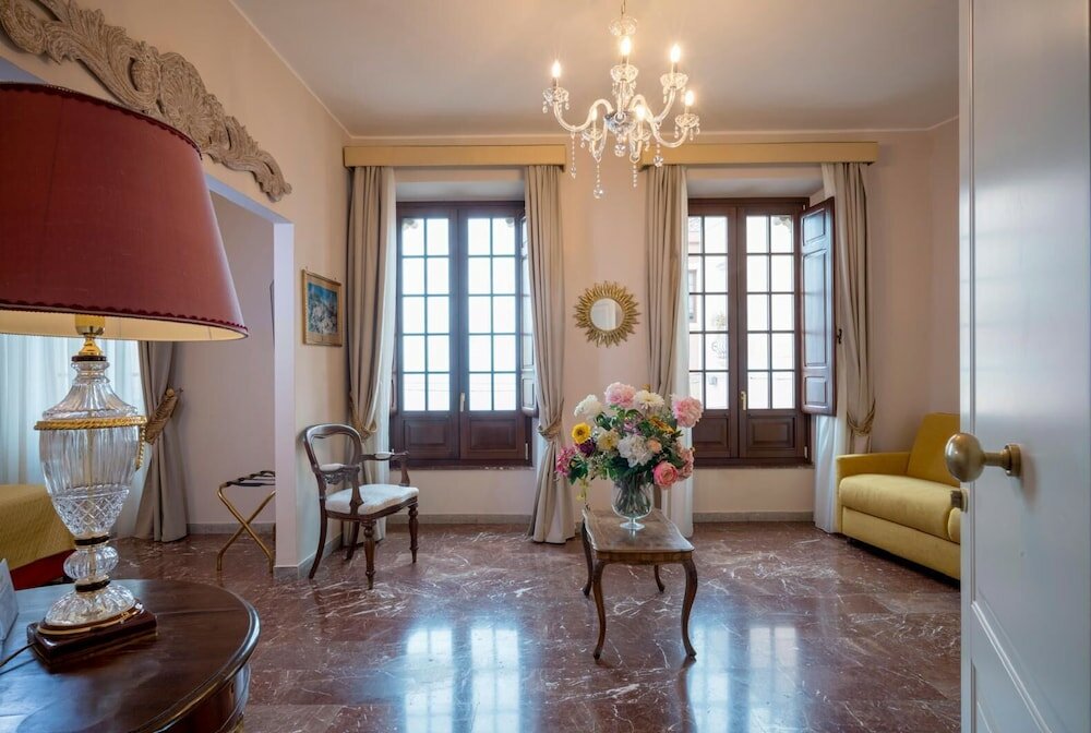 Фото Porta Di Mezzo Luxury B&b