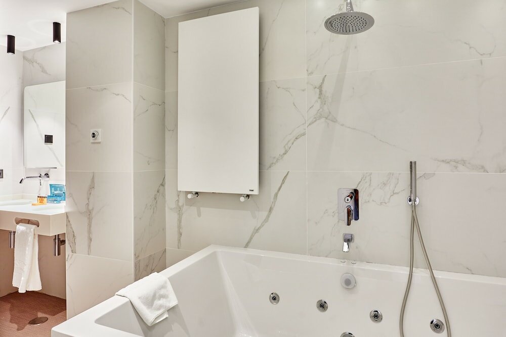 Фото Hotel Silken Ciudad Gijon