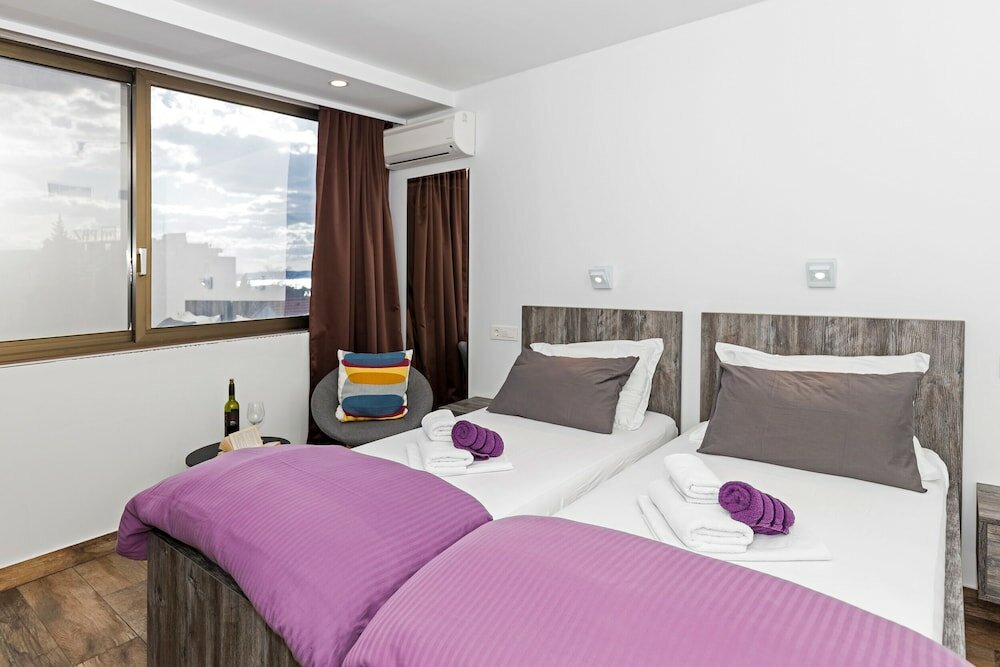 Фото Apinelo Tower Rooms