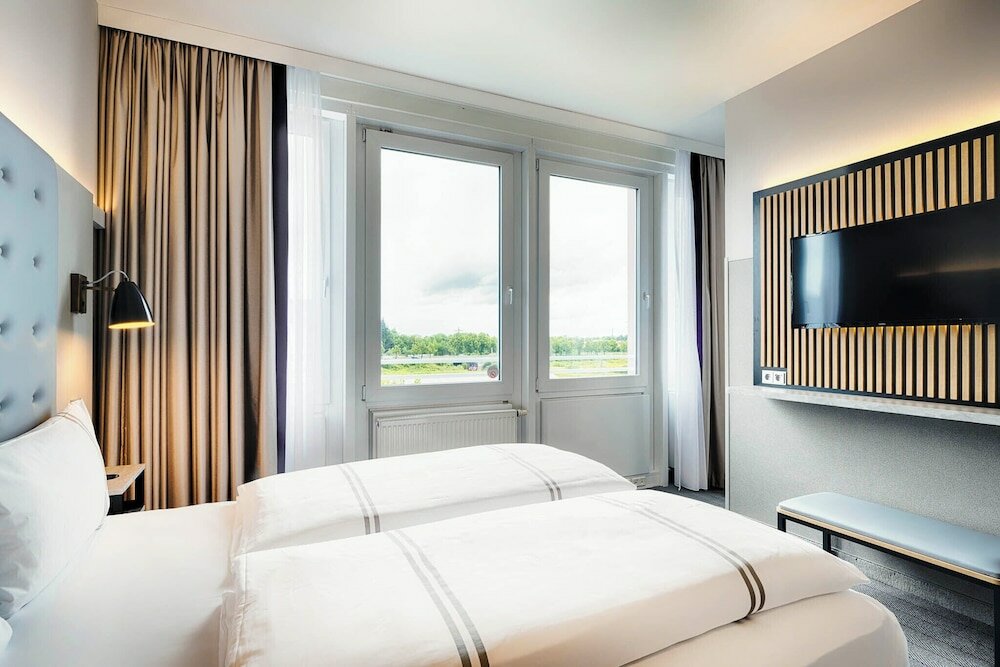 Фото Acom-Hotel Munich