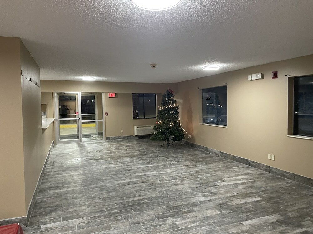 Фото Designer Inn & Suites