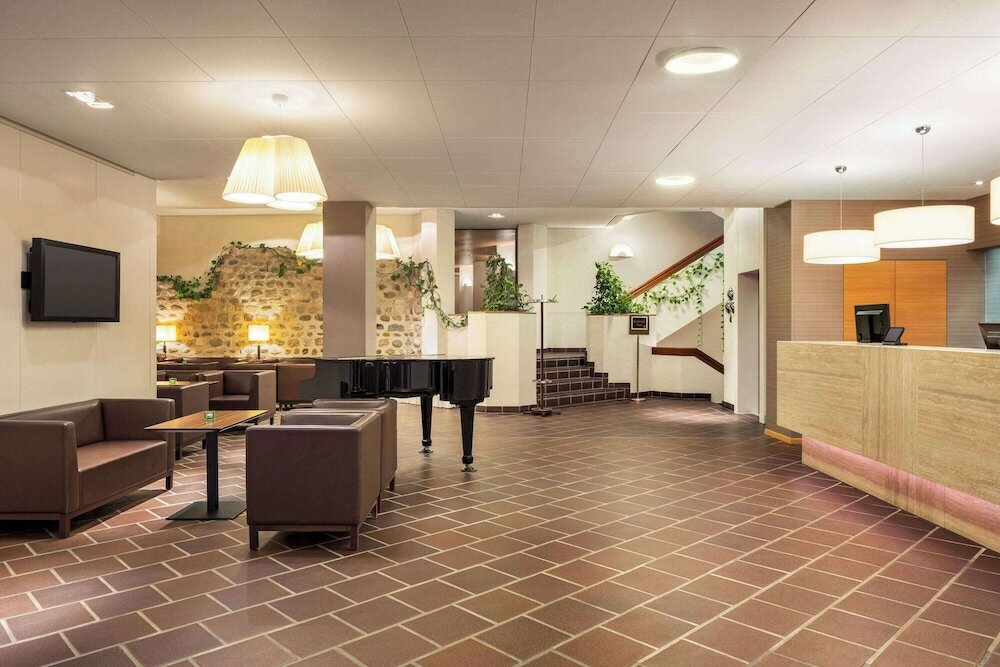 Фото Ramada by Wyndham Baden Hotel du Parc